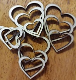 Wooden hearts 50mm largest. 12 per pack. Min buy 3.